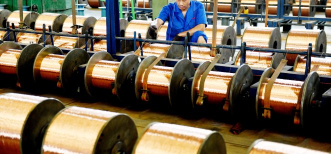 A worker in a copper wire factory