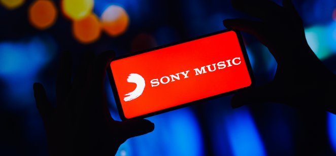 In this photo illustration, the Sony Music Group logo is displayed on a smartphone screen