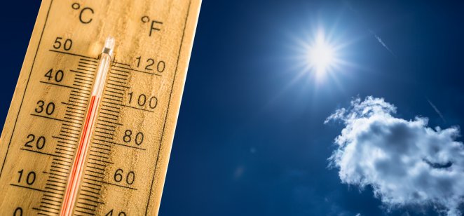 Stock photo of a hot summers day and a thermometer