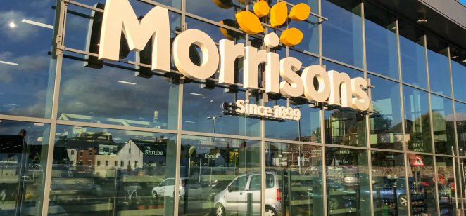 A picture of the exterior view of the front of the Morrisons supermarket in Abergavenny town centre