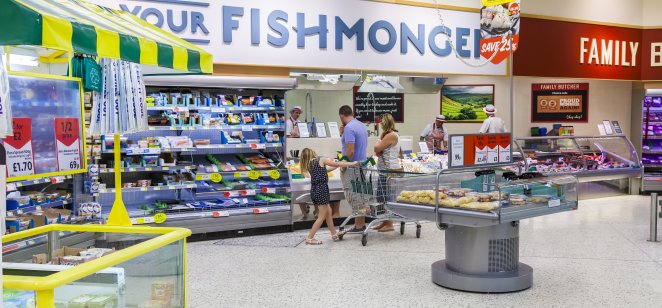A family making their selection at a Morrisons’ fishmonger counter