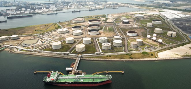 A crude oil carrier docked at a tank farm on Jurong Island, Singapore.
