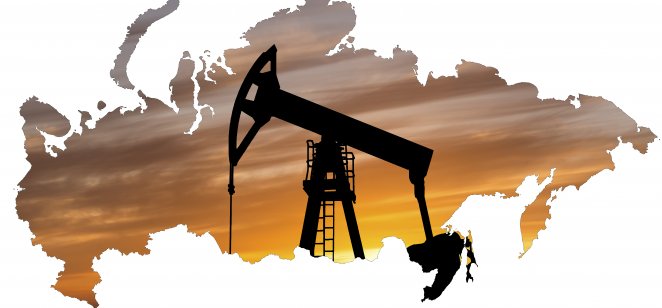 An oil pump against the map of Russia.
