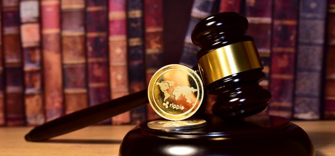 The XRP coin on a gavel