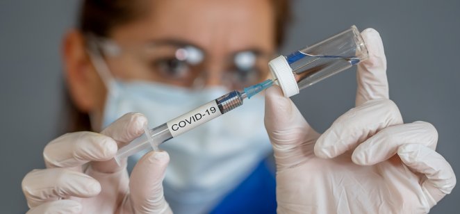 Covid-19 vaccine in syringe 