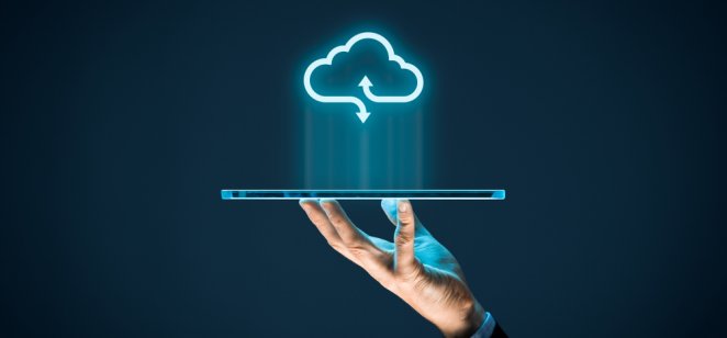 A graphic representing a cloud computing concept of a tablet linked to a cloud
