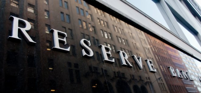 Australian dollar (AUD) surges RBA sign outside its headquarters in Sydney