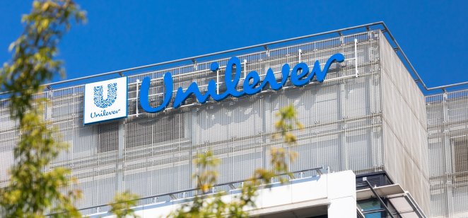 A picture of a Unilever logotype on the top of an office building