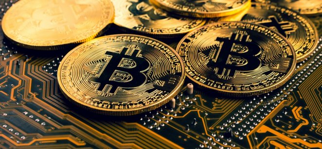 Bitcoin logo Gold coins with bitcoin logo