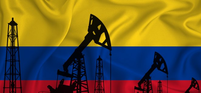 Drilling rigs and oil derricks on the background of the flag of Colombia