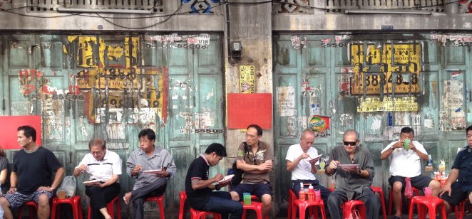 People eating food in the street, Bangkok, Thailand
