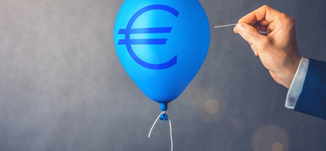 Concept of financial risk shown with a blue balloon with Euro currency symbol on it, to which a man holds a needle