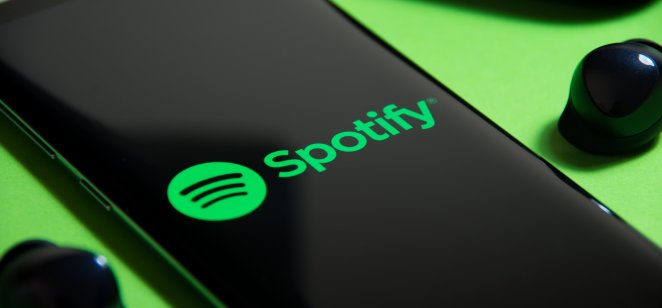 A image of the Spotify logo on a smartphone