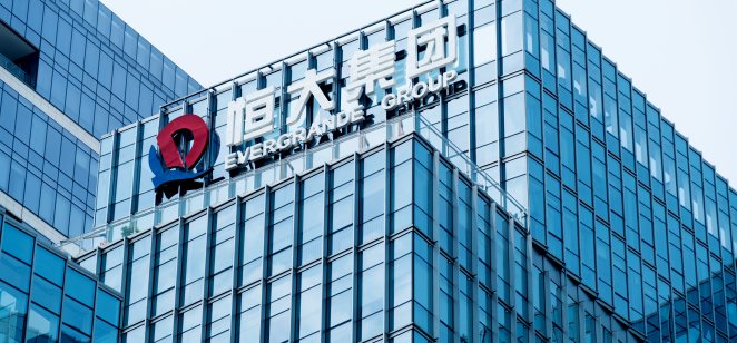 China Evergrande Group logo on office building wall.