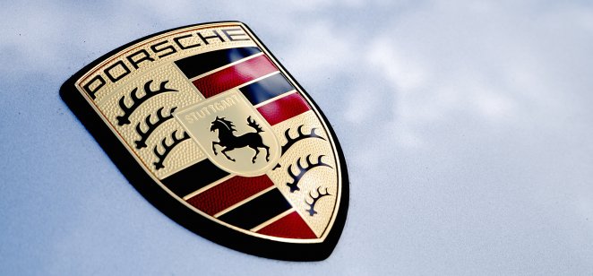 Close up detail logo of the rear of a Porsche 911.