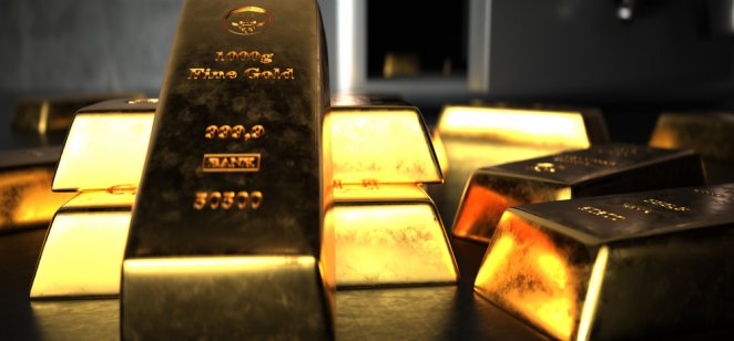 Gold to hit $20,000 in a dollar crash, US economist predicts Fine gold bars in front of an open safe.