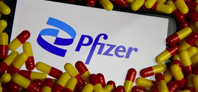 Kumamoto, JAPAN - Jul 27 2021 : Logo of US multinational pharmaceutical and biotechnology corporation Pfizer Inc. headquartered on 42nd St. in Manhattan NYC, on tablet. Man hand holding wireless pen.