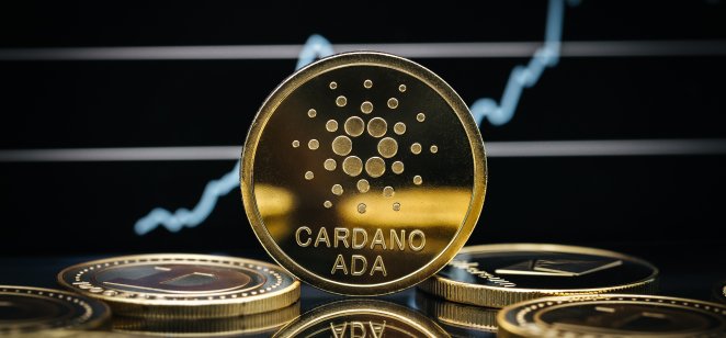 Cardano Ada cryptocurrency coin close-up, in front of a price chart.