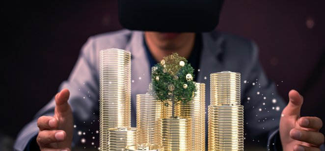A person wearing virtual reality goggles in front of VR gold coins