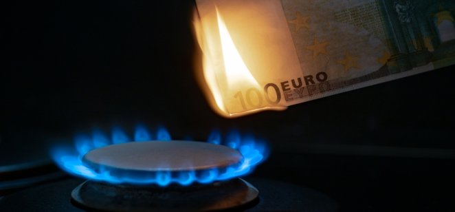 100 euro banknote on a gas burner. The concept of cost for natural gas. Energy crisis.