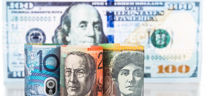 Close-up of Australian currency notes against US dollar.