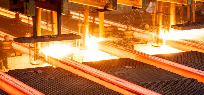 Hot steels on a conveyor in a steel mill