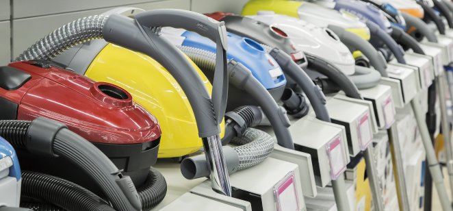 A selection of vacuum cleaners in a story