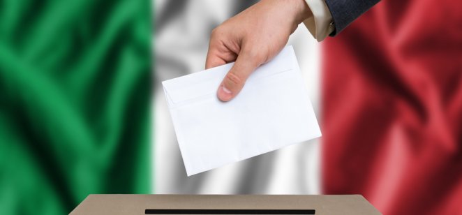italian elections Concept of italian elections. An image shows The hand of man putting his vote in the ballot box with the italian flag on the background