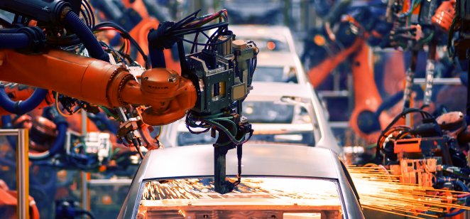 Robotic arms on a car production line