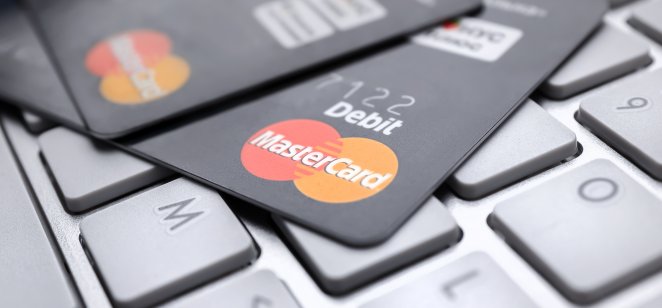 Mastercard (MA) stock forecast KIEV, UKRAINE - OCTOBER 2, 2017: MasterCard credit cards on keyboard