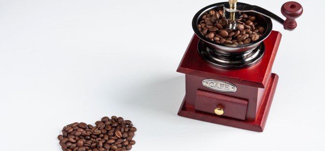 Coffee bean heart and old-fashion coffee grinder