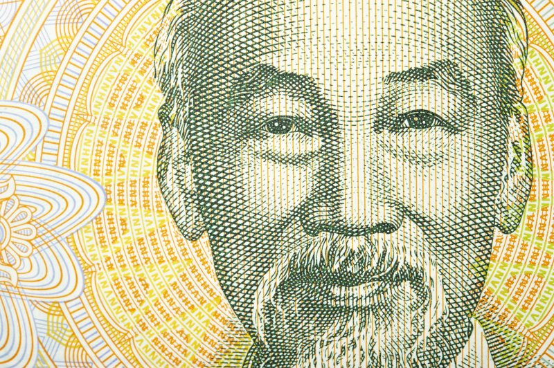 Vietnamese dong forecast Ho Chi Minh on a Vietnamese dong banknote