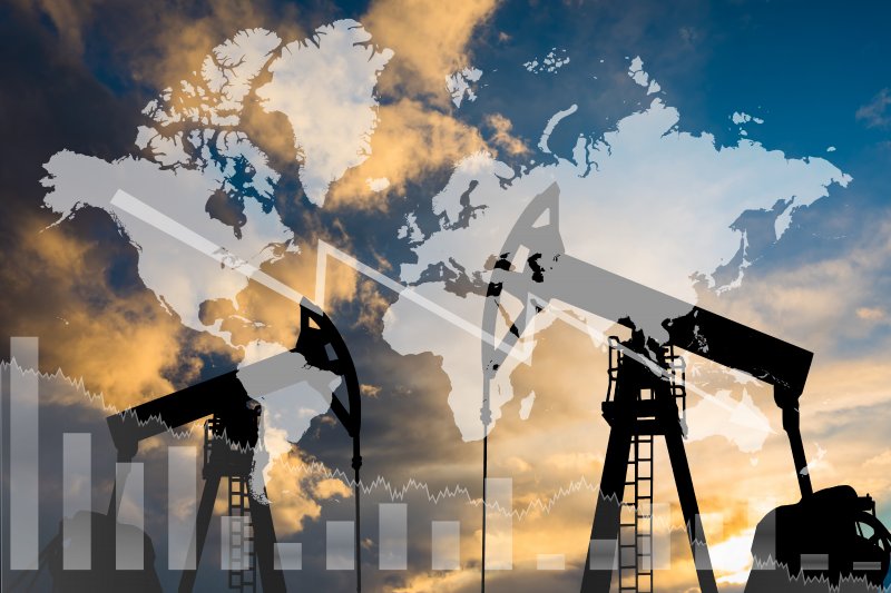 Global oil prices illustration Oil pump on the background of a world map