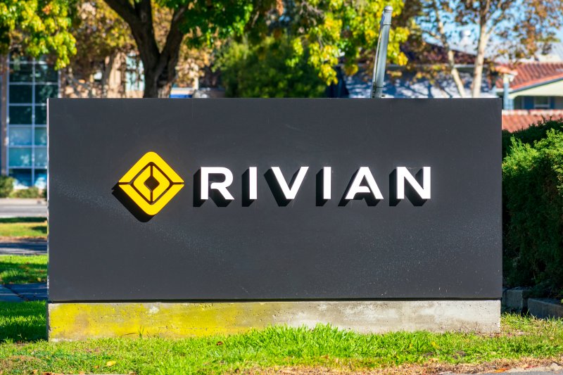 Rivian shareholders Rivian sign logo at headquarters in Silicon Valley.