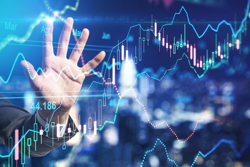 Tata Power share price forecast 2022-2025: Investing in future renewables? Stock market investment concept with businessman hand touching digital screen with forex chart indicators. Double exposure Tata Power share price forecast 2022-2025: Investing in future renewables? Stock market investment concept with businessman hand touching digital screen with forex chart indicators. Double exposure