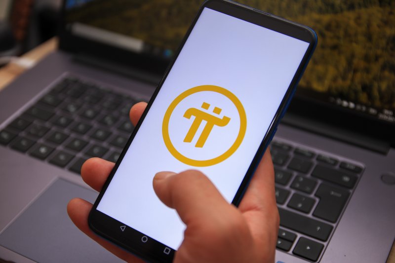 Pi Network logo Pi Network logo displayed on a smartphone