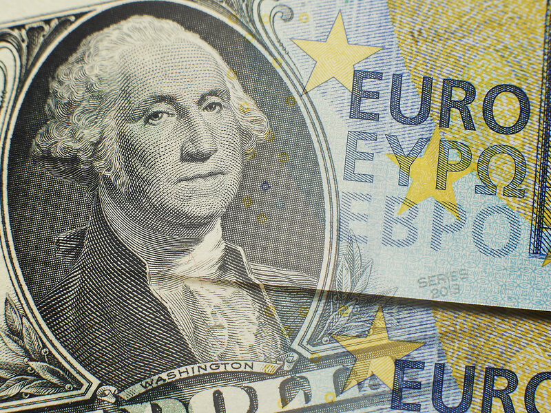 Euro slips; U.S. dollar inches higher in volatile trading