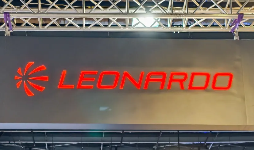 Leonardo company logo illuminated in red on a large display panel