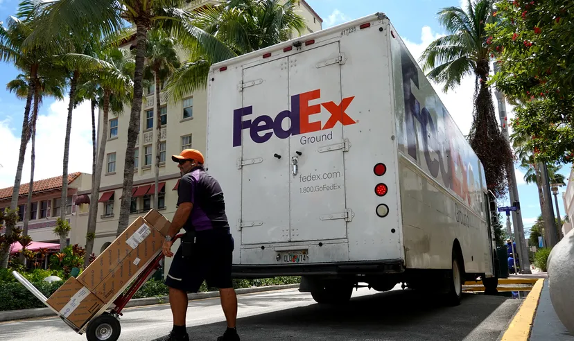 FedEx worker makes a delivery in Miami Beach, Florida