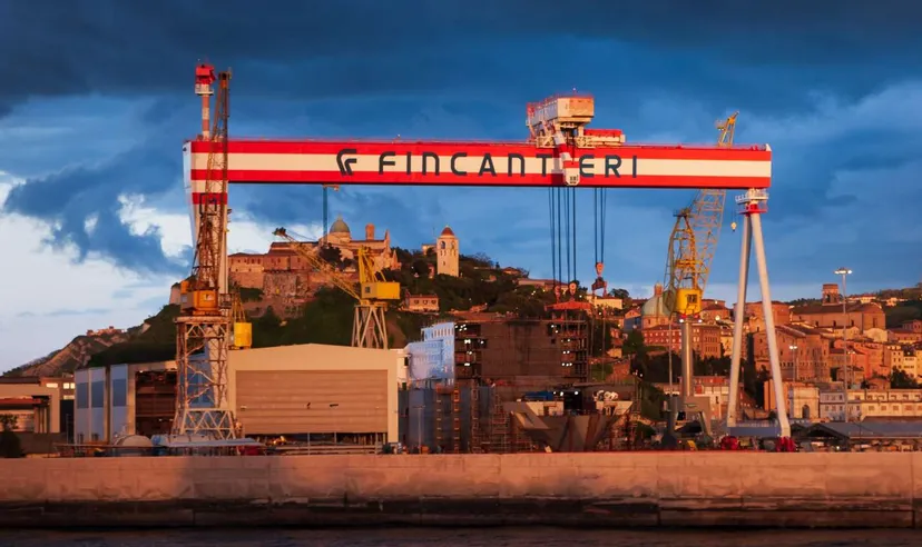 Fincantieri shipyard with cranes and industrial infrastructure Fincantieri shipyard with cranes and industrial infrastructure