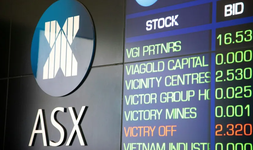 ASX200 hits all-time high as weak jobs data raises prospects of more RBA cuts The ASX logo and ticker board.