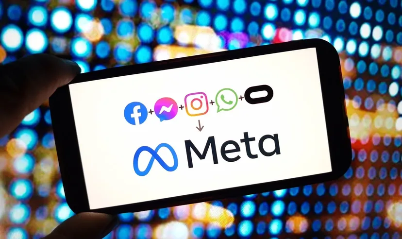 Smartphone mit Meta-Logo und Facebook, Messenger, Instagram und WhatsApp Icons auf buntem digitalem Hintergrund