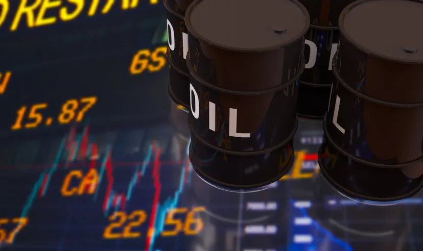 Oil barrels on trading screen Black oil barrels standing on a reflective trading screen in front of blurred stock prices and a price chart, illustrating crude oil and commodity markets