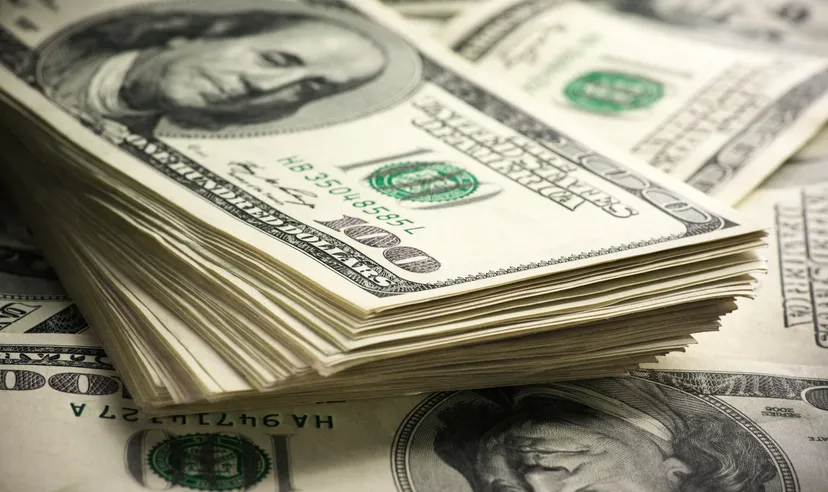 Stack of one hundred dollar bills close-up. Stack of one hundred dollar bills close-up.