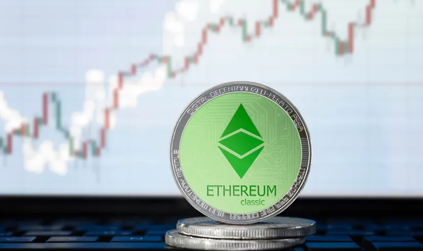 Ethereum Classic (ETC) coins with price chart behind them