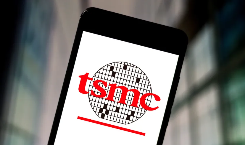 Taiwan Semiconductor (TSM) stock forecast In this photo illustration the Taiwan Semiconductor Manufacturing Company (TSMC) logo is displayed on a smartphone.
