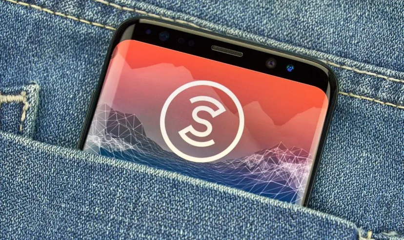 The Sweatcoin (SWEAT) logo on a smartphone screen