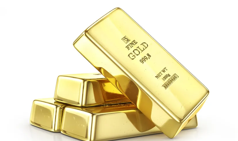 Gold ingot isolated on a white.