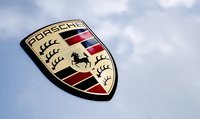 Close up detail logo of the rear of a Porsche 911.