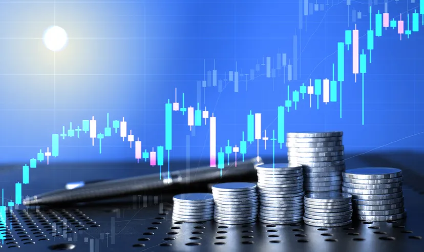 Piles of coins against a backdrop of a rising graph, depicting inflation
